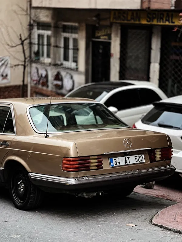Brown Vintage Mercedes Benz Car Parked on City Street