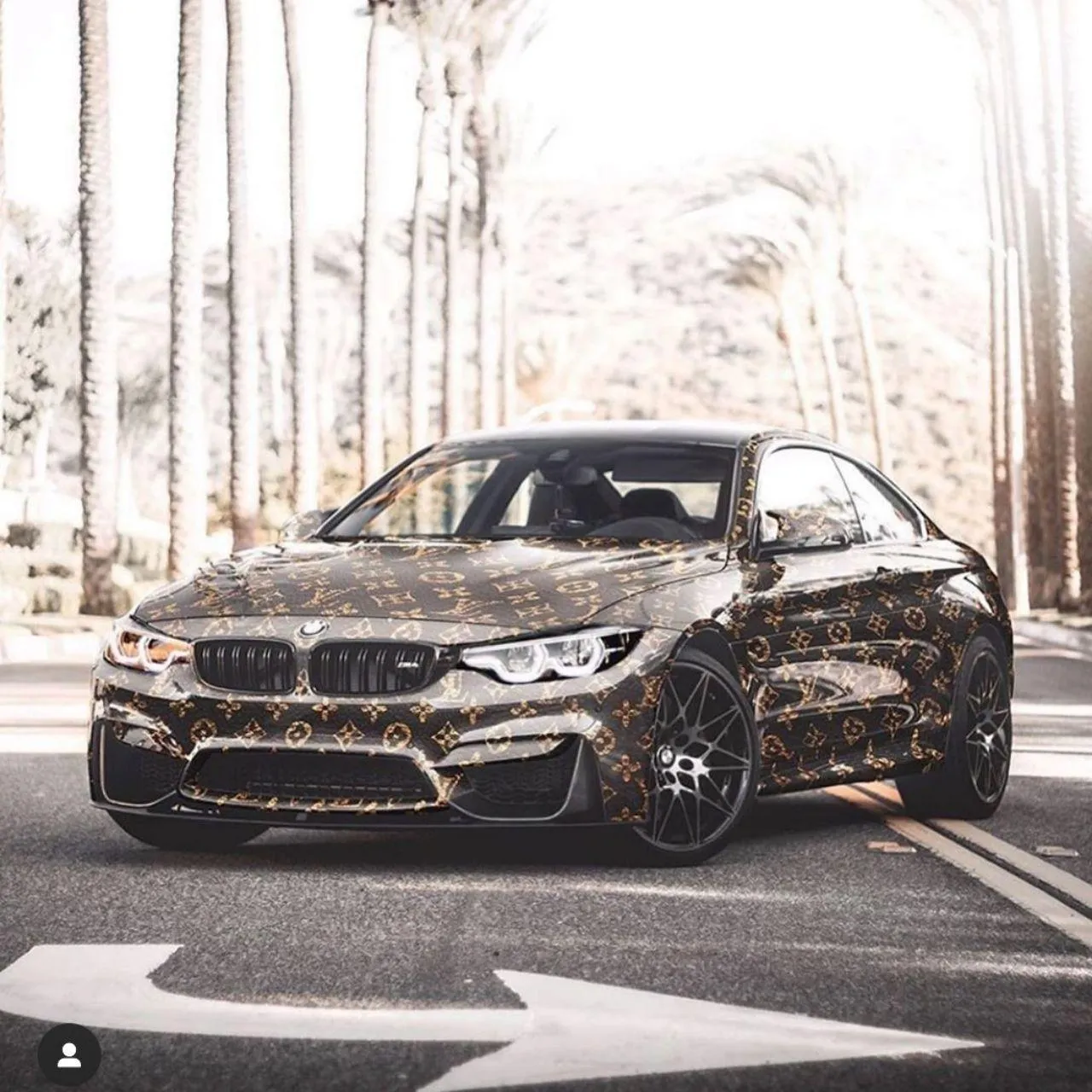 Camouflaged Bmw Test Car Parked Near Trees Wallpaper