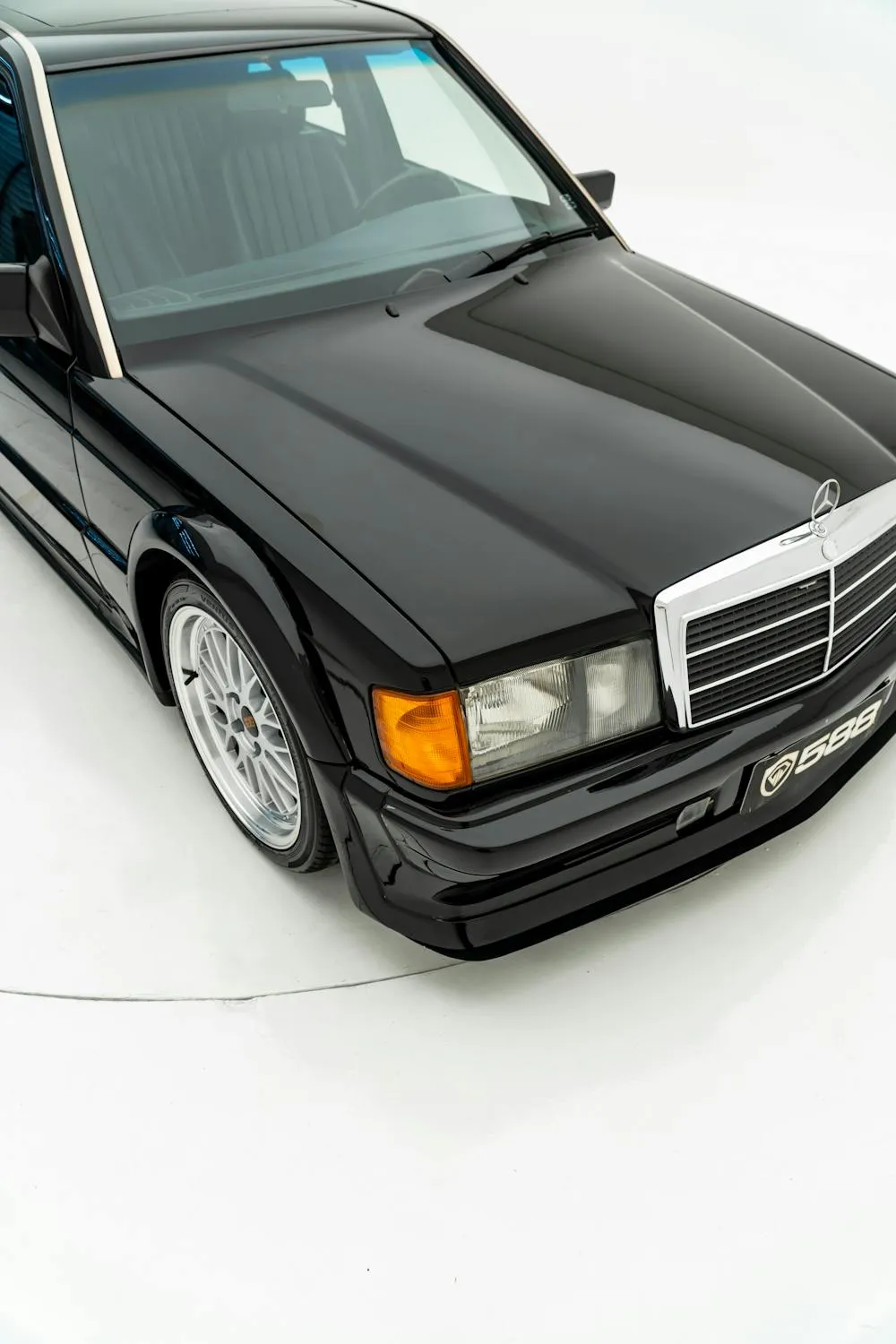 Classic Black Mercedes Benz Sedan in Studio Atmosphere