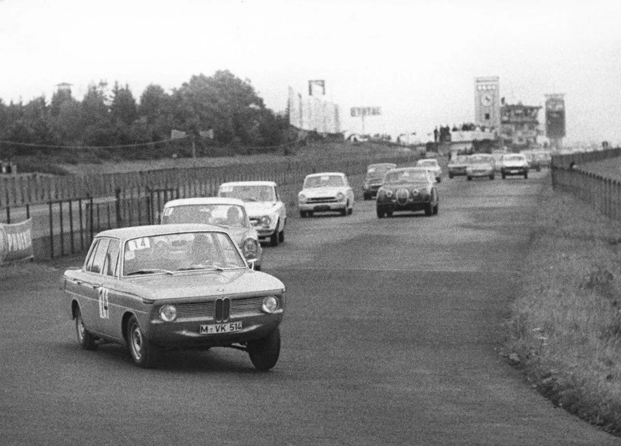 Classic Bmw Car in Black and White on Busy City Road