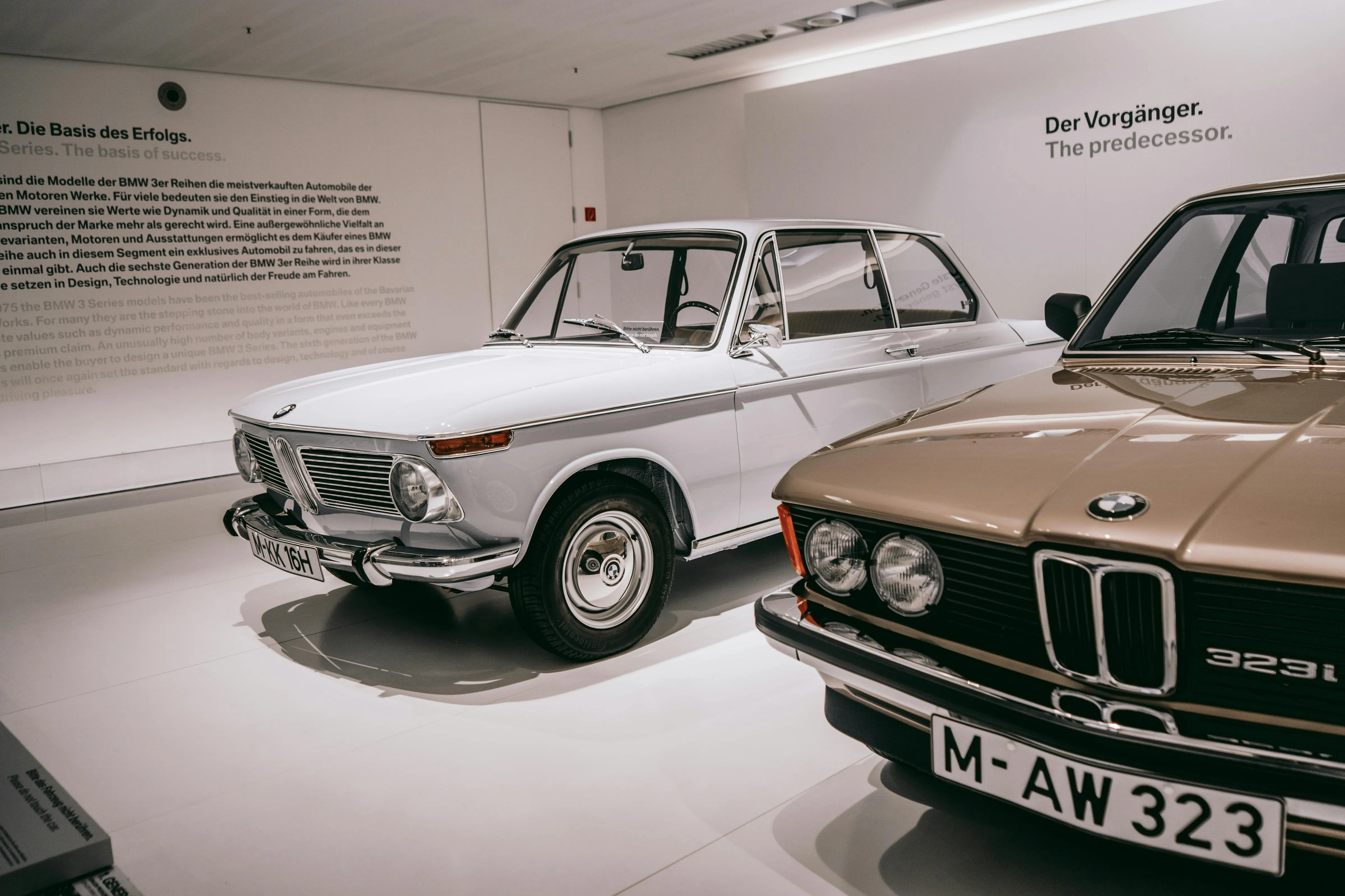 Classic Bmw Cars Displayed Inside a Museum Room Wallpaper