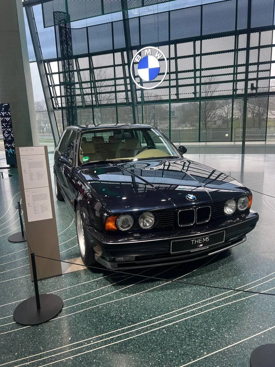 Classic Bmw Model Displayed in a Glass Museum Wallpaper