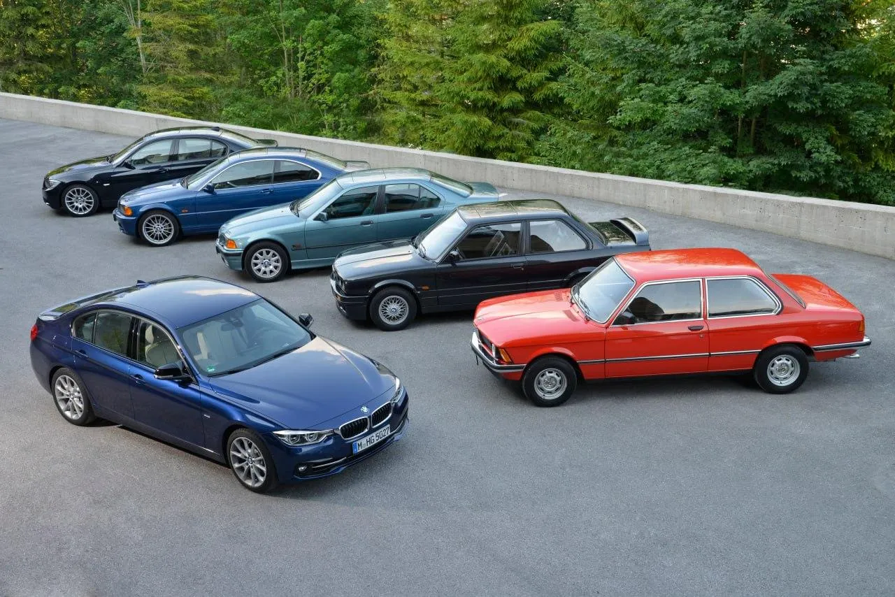 Classic Bmw Models Lined Up on a Concrete Platform