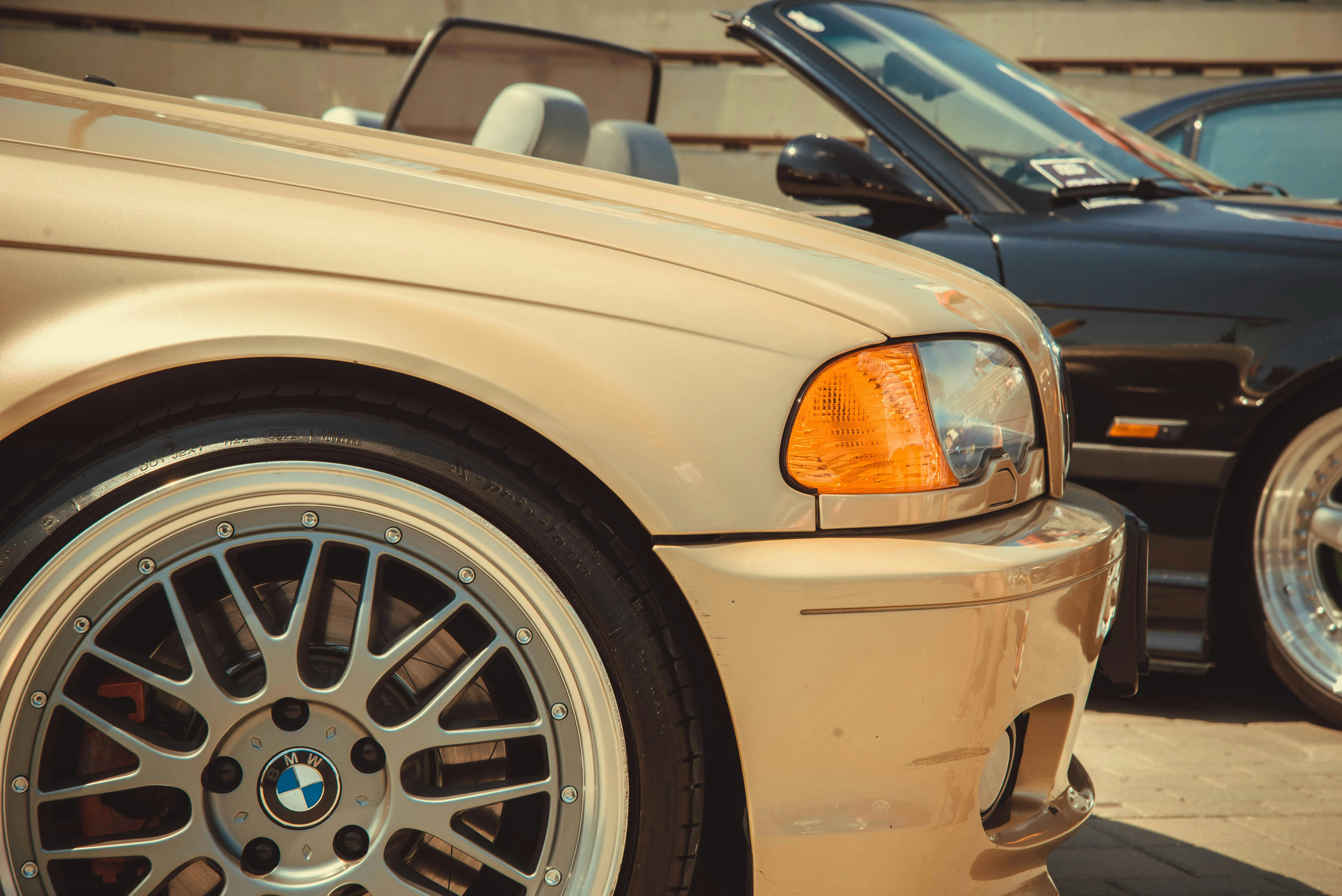 Classic Bmw Parked Beside Another in Sunny Street Image