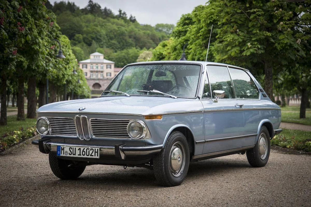 Classic Bmw Parked on Quiet Road with Trees Around