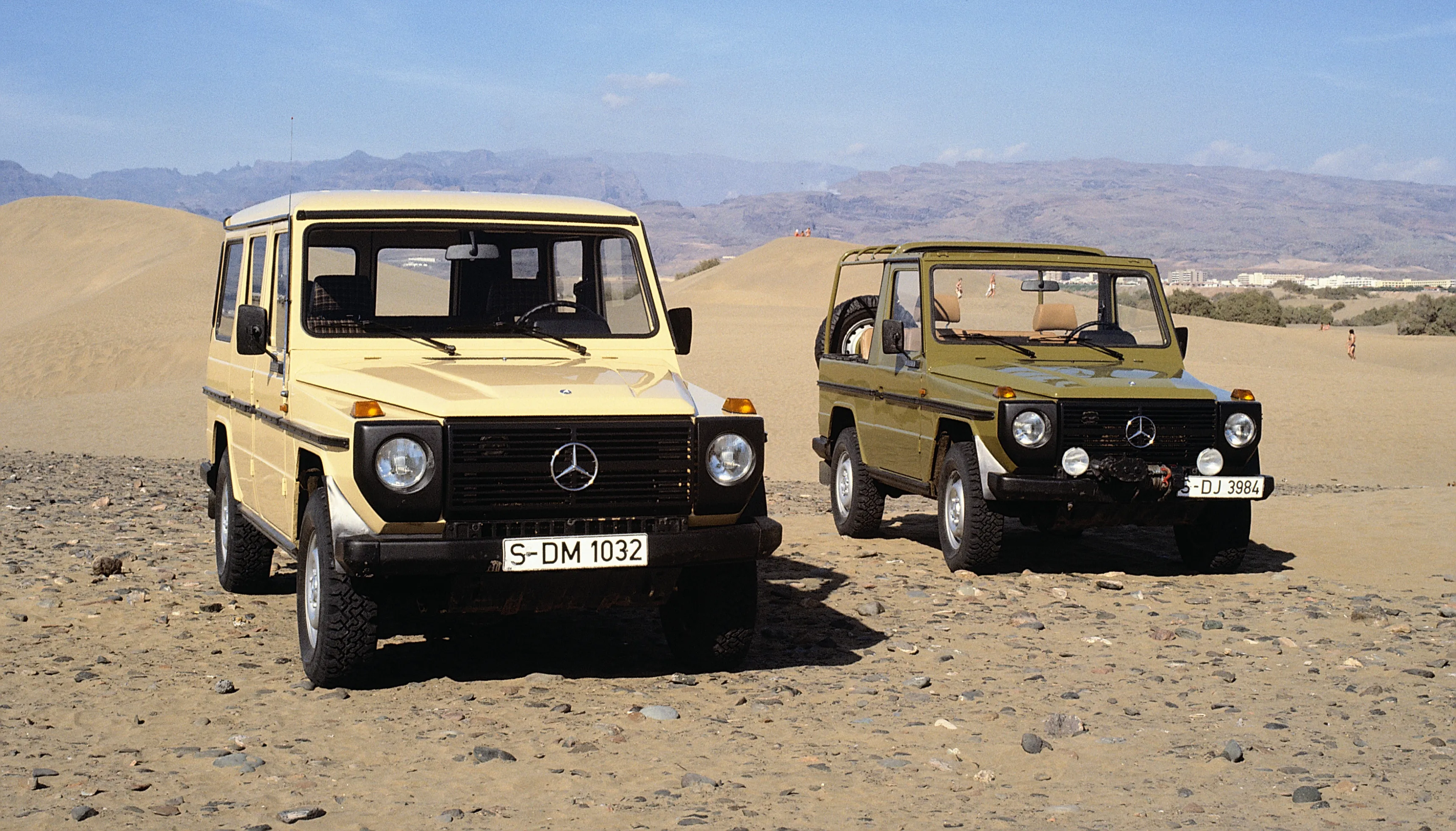 Classic Mercedes Benz Offroad Vehicles in Desert Landscape