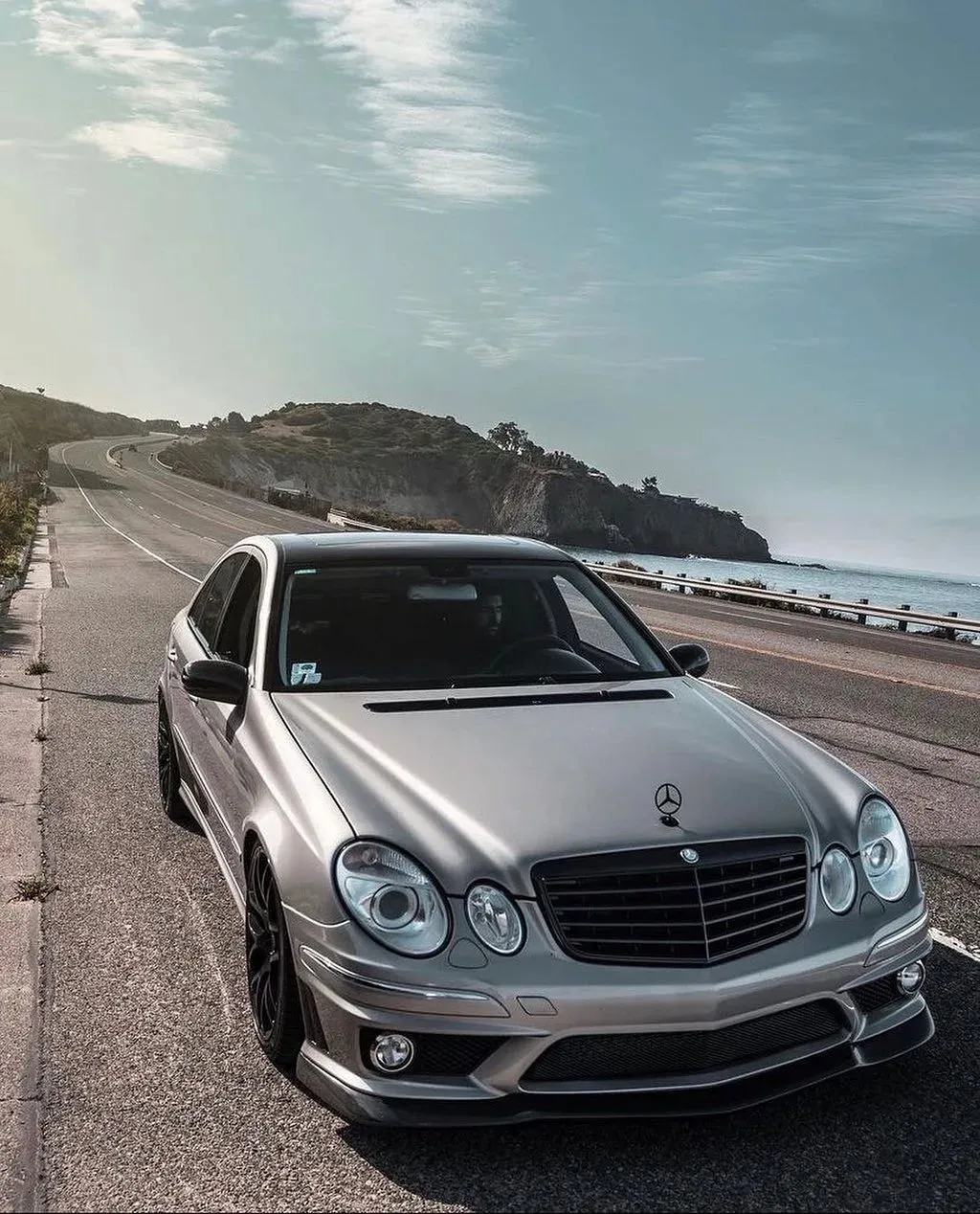 Classic Mercedes Benz Parked Near Ocean Driveway Wallpaper