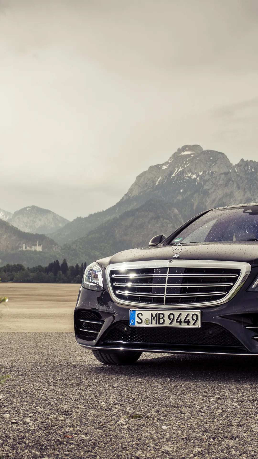 Classic Mercedes Benz Sedan in Mountain Landscape Wallpaper