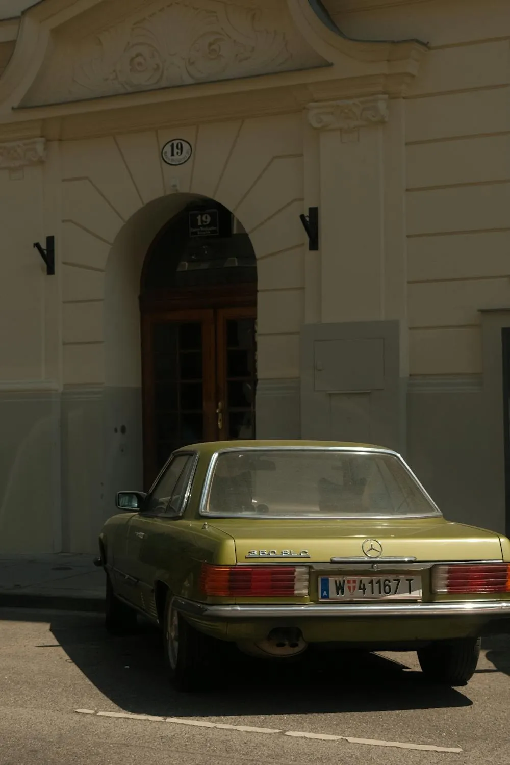 Classic Mercedes Benz Sedan Parked Near Old Building