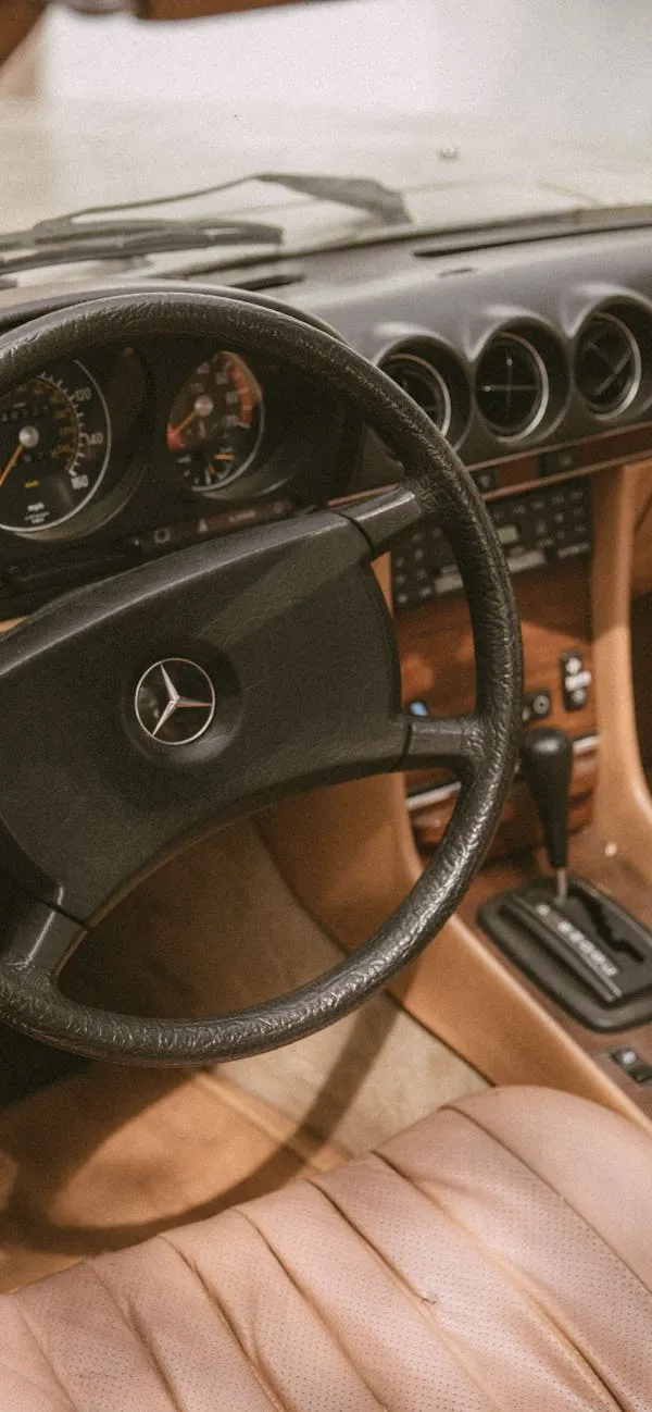 Classic Mercedes interior showing vintage wooden dash