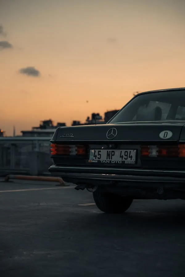 Classic Mercedes Parked Outdoors During Sunset Wallpaper