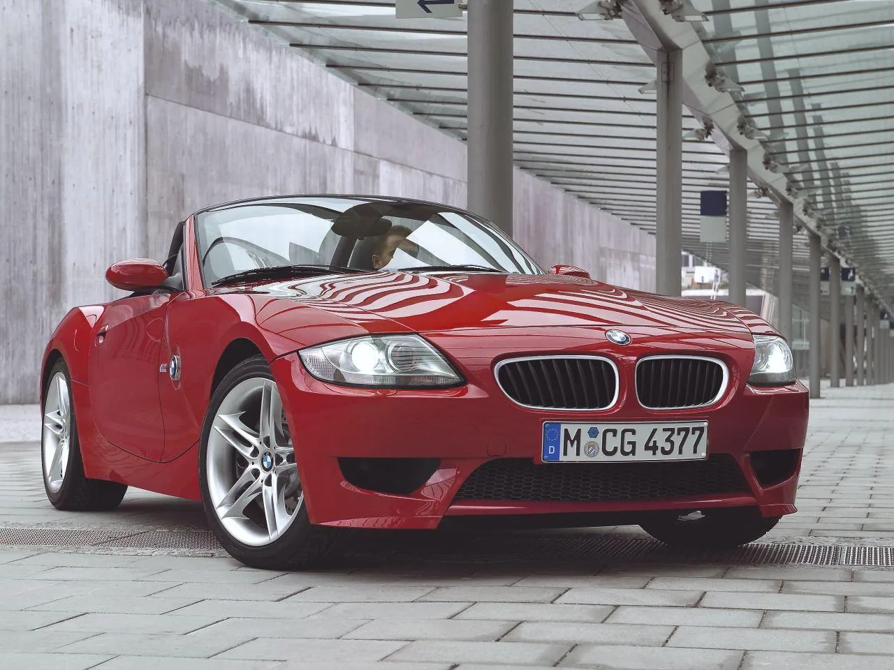 Classic Red Bmw Roadster Parked in Urban Outdoor Setting