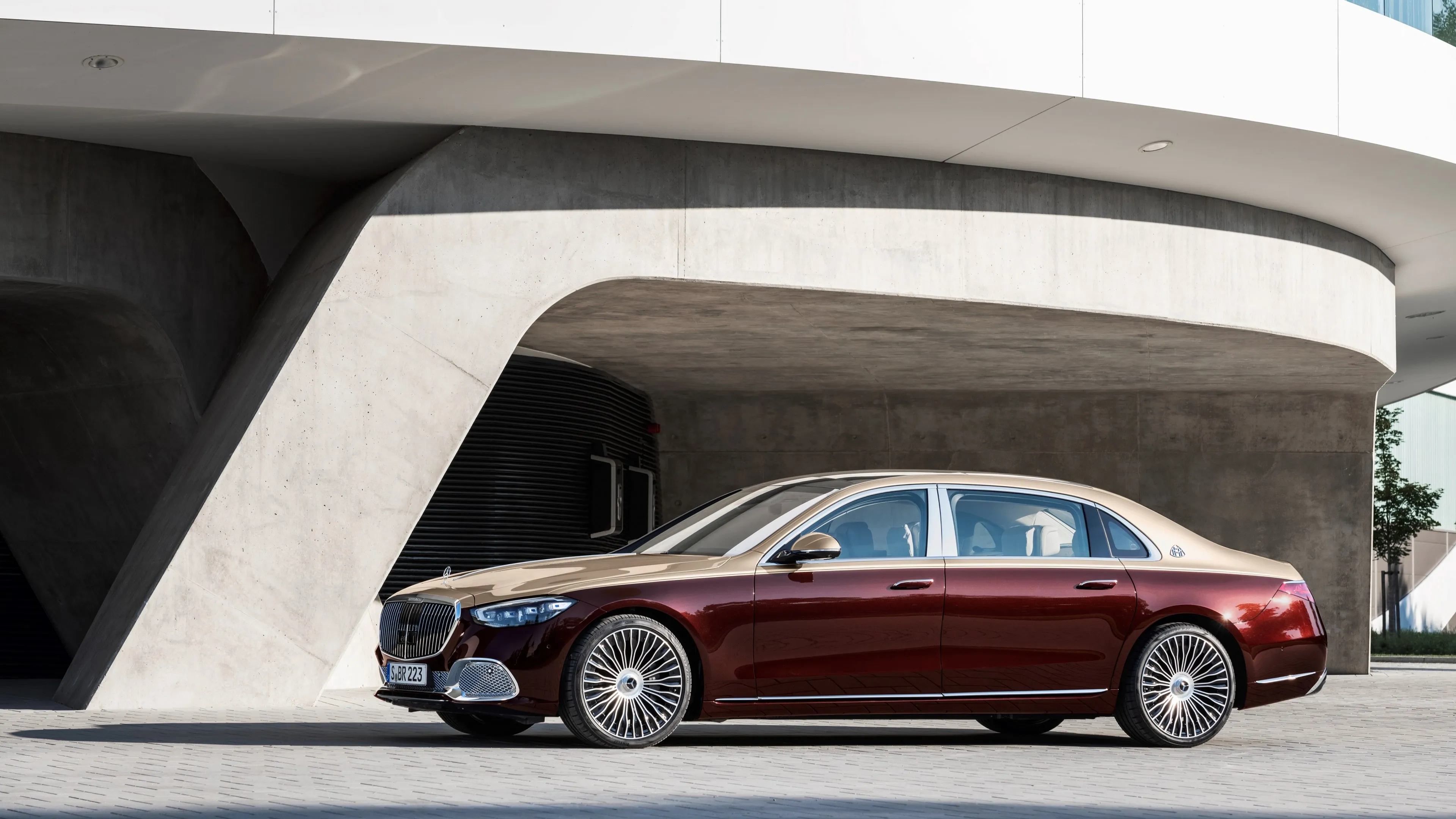 Classic Red Mercedes Benz Sedan Parked by Concrete Wall