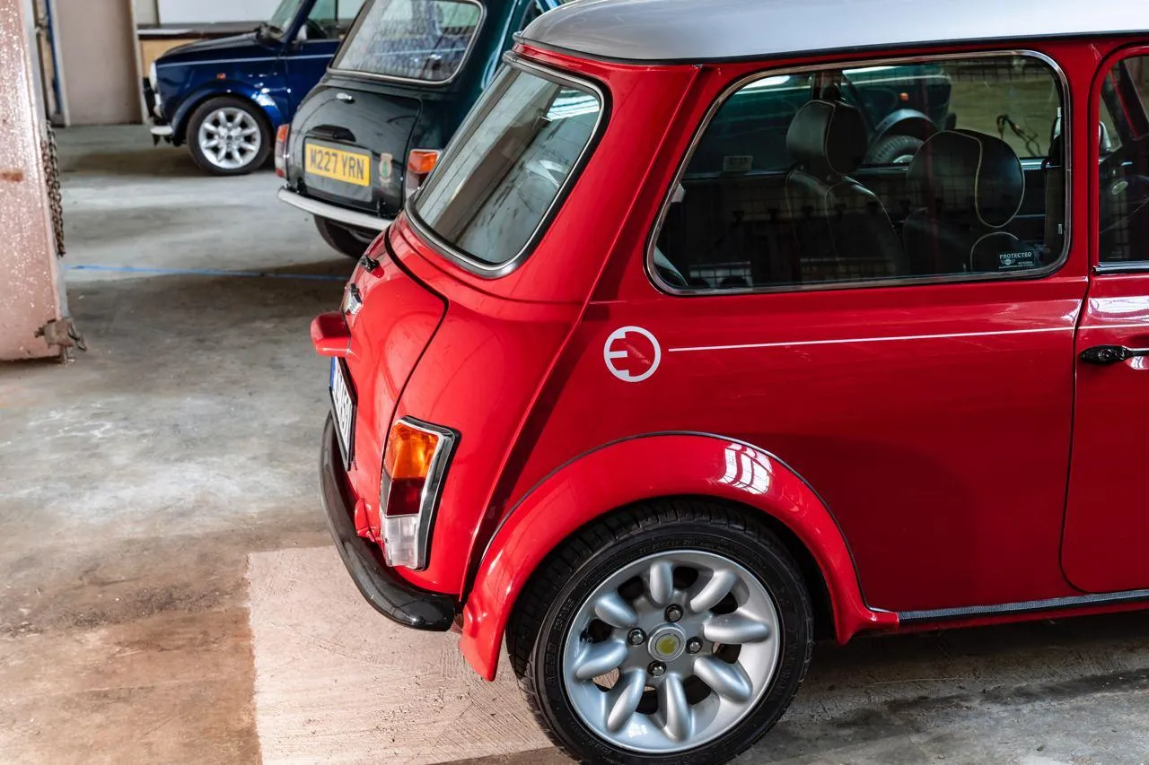 Classic Red Mini Cooper Parked in Garage Or Indoor Space