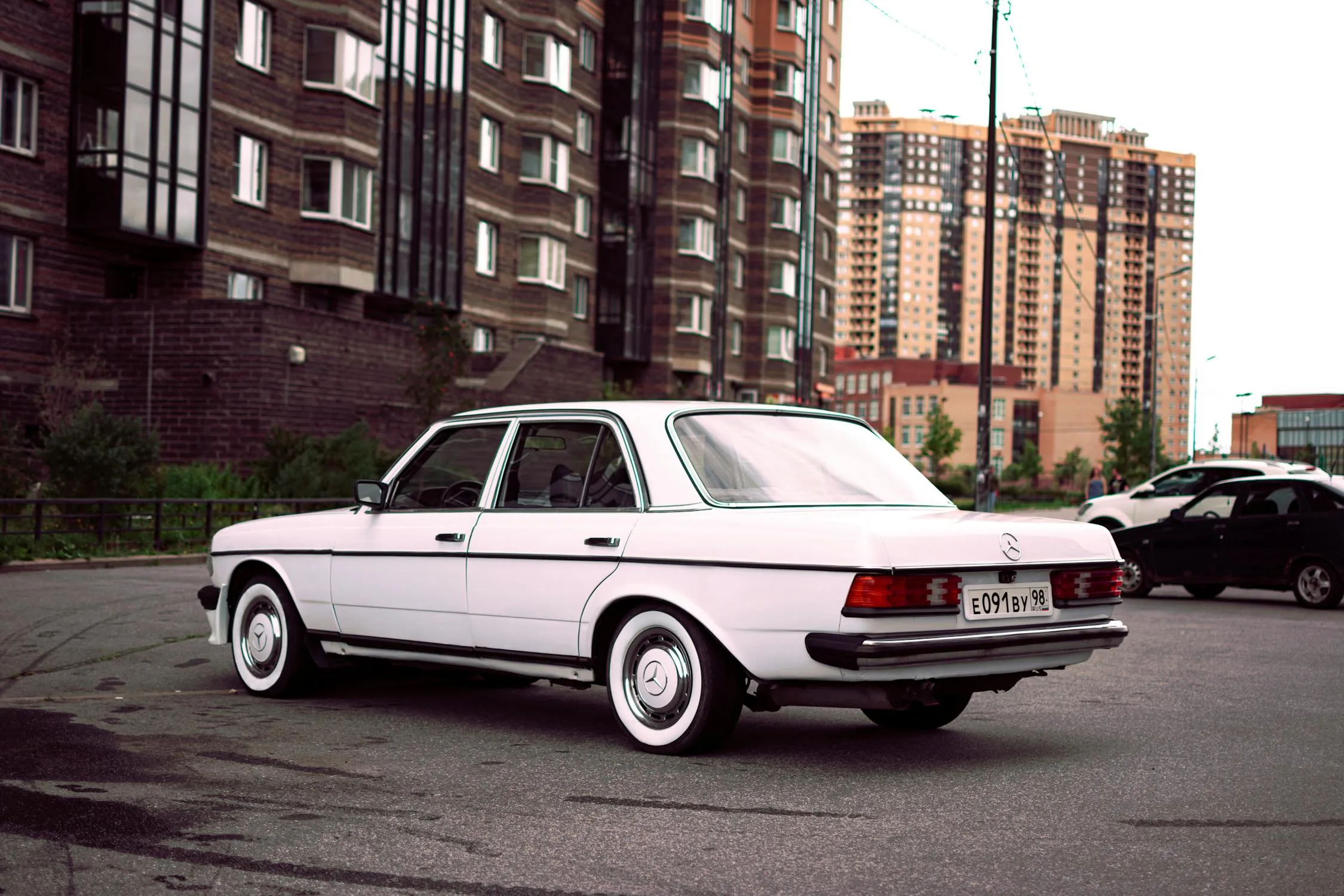 Classic White Mercedes Benz Parked City Street Wallpaper