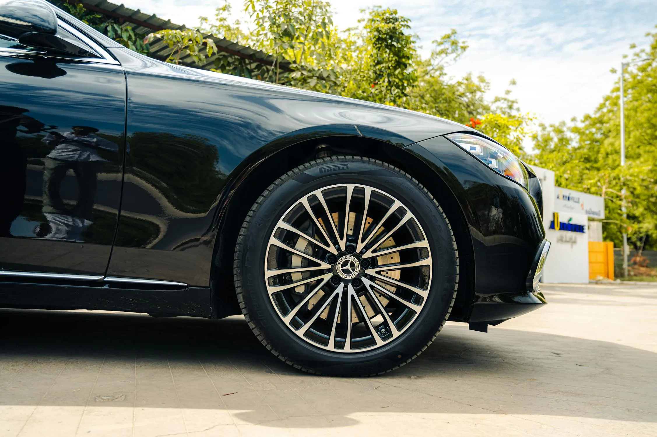 Close Up of Black Mercedes Wheel and Body Wallpaper 4K