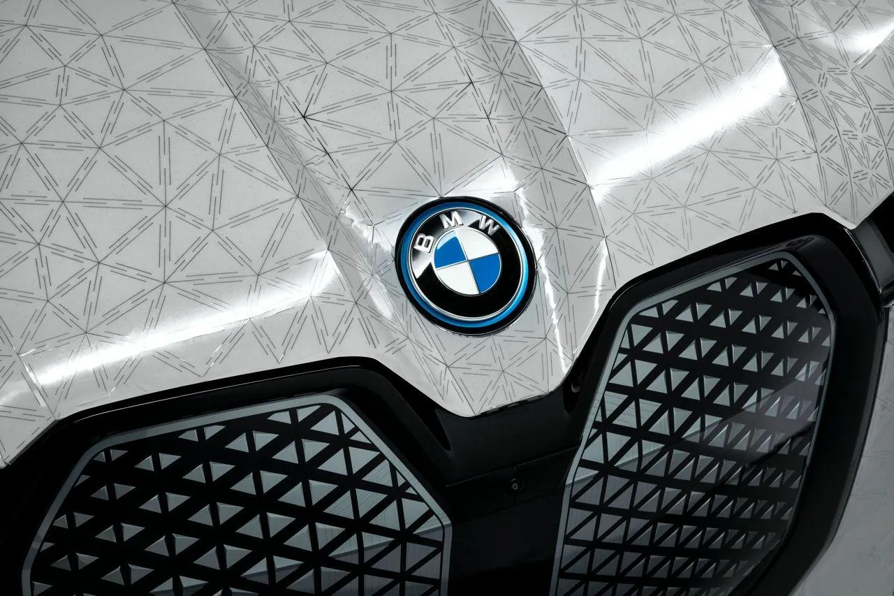 Close Up of Bmw Car Grille with Geometric Pattern Image