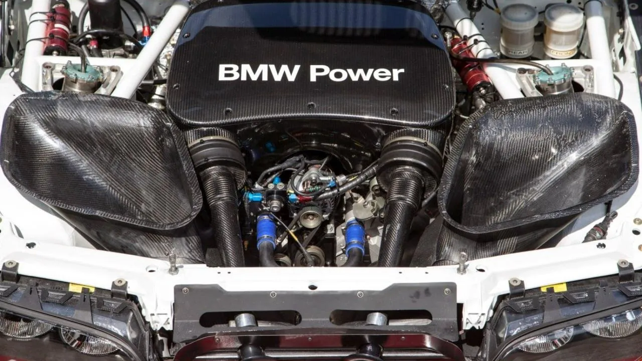Close Up of Bmw Engine Showing Detailed Mechanics and Power