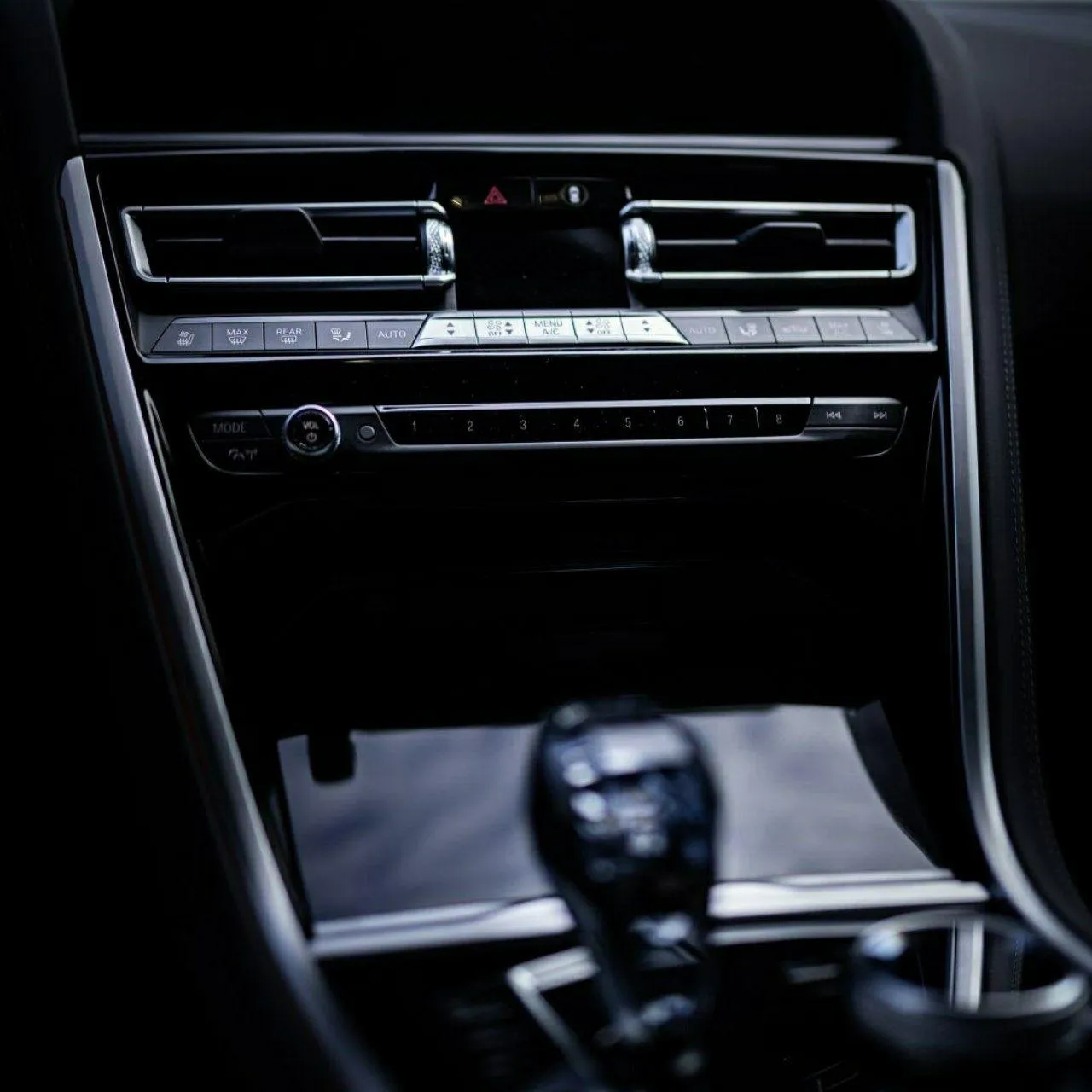 Close Up of Bmw Gear Shifter and Central Dashboard Unit