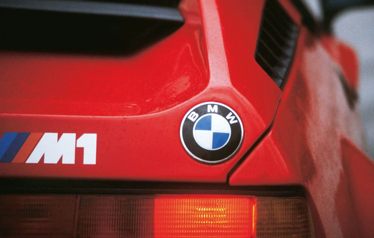 Close Up of Bmw M1 Badge and Tail Light in Red Paint
