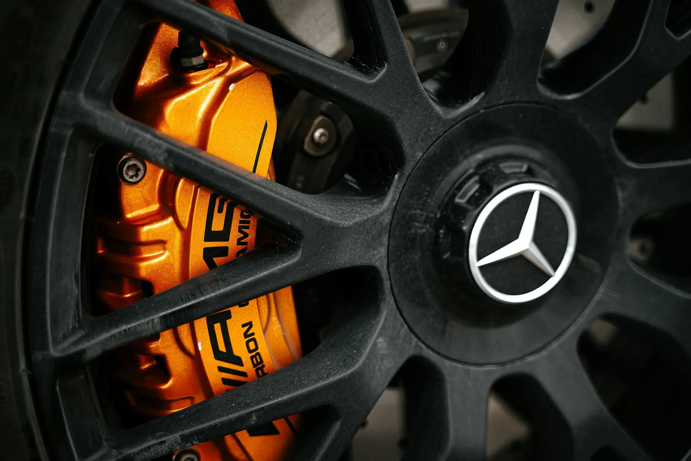 Close Up of Mercedes Benz Brake Disc and Caliper with Logo
