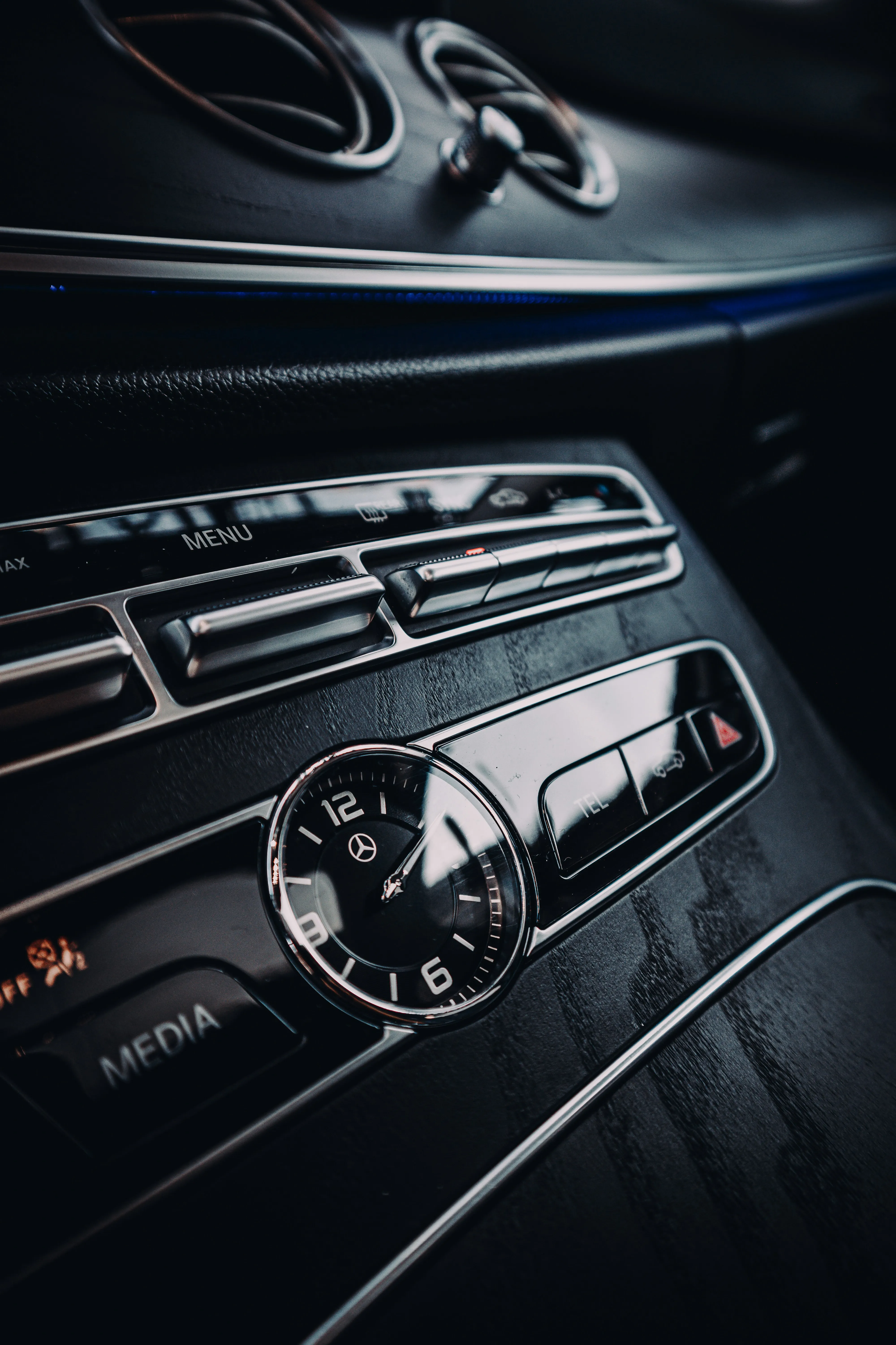 Close Up of Mercedes Benz Dashboard and Analog Clock