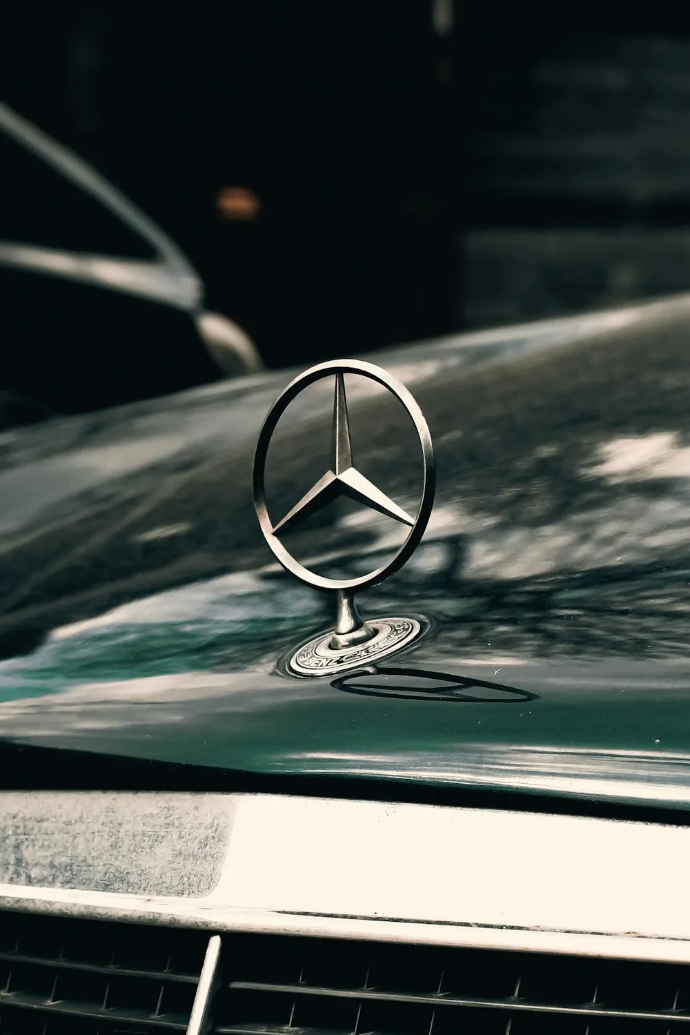 Close up of Mercedes Benz Hood Ornament on Vintage Car