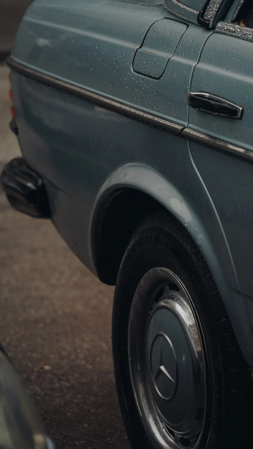 Close up of vintage Mercedes rear wheel and body detail