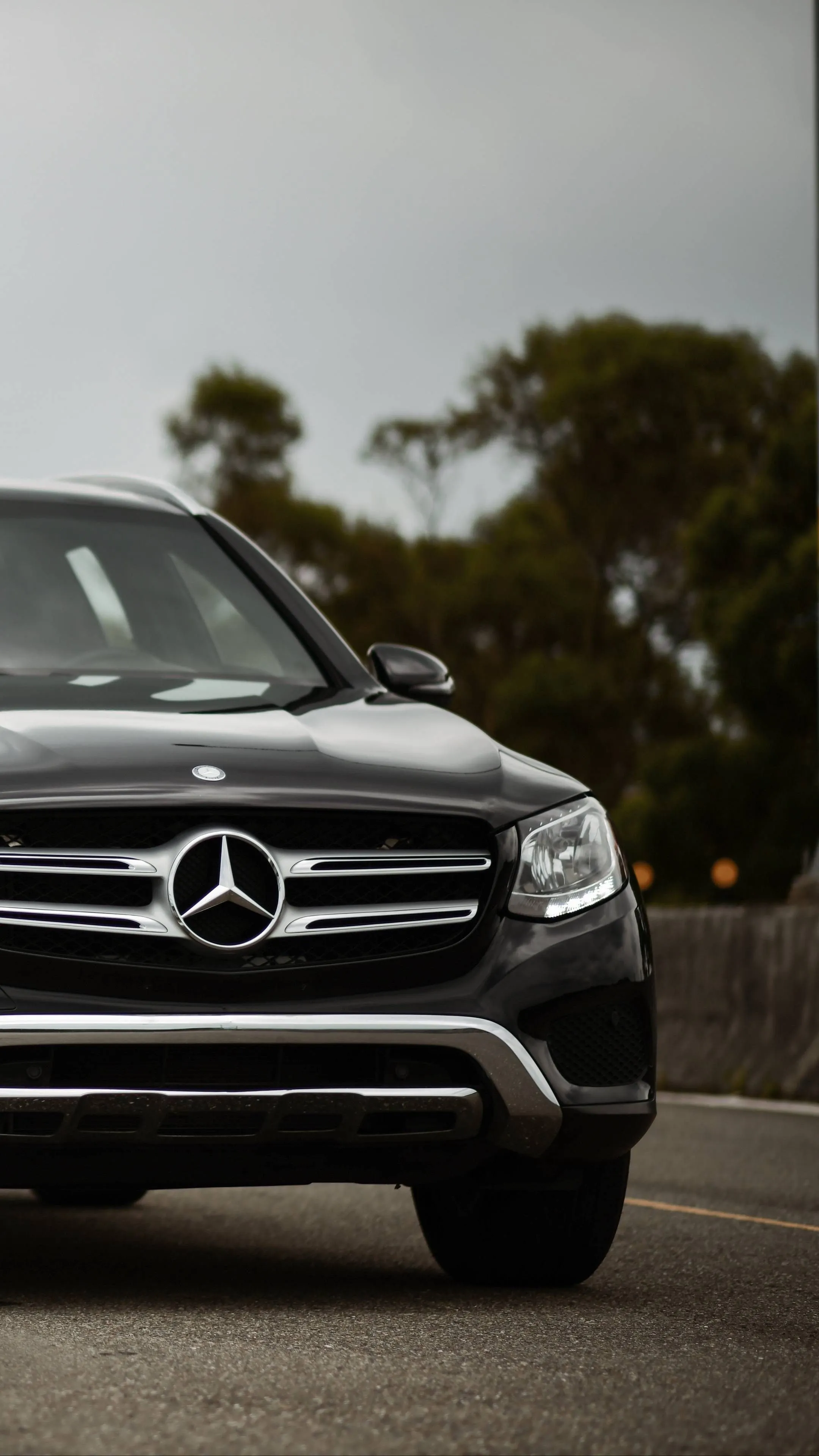 Close Up View of Mercedes Front Grille on Urban Road