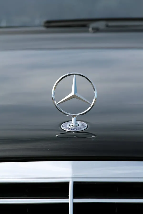 Close View of Mercedes Bonnet with Silver Emblem Wallpaper