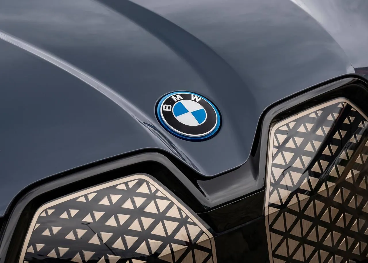Closeup of Bmw Badge on Futuristic Patterned Grille Hd