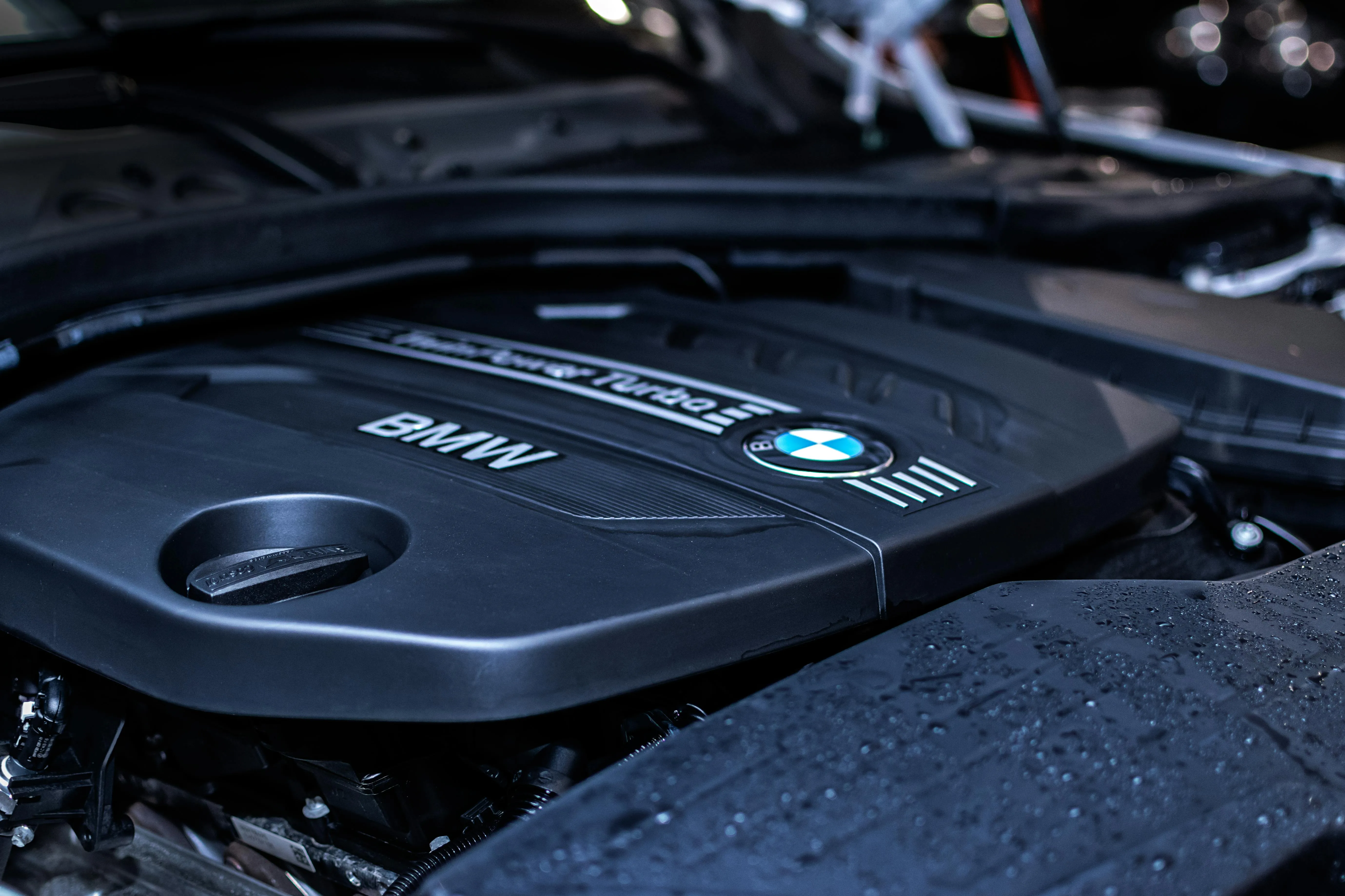 Closeup of Bmw Engine Bay with Hybrid Electric Badge