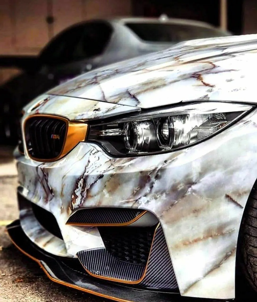 Closeup of Bmw Sports Car with Unique Marble Camo Wrap