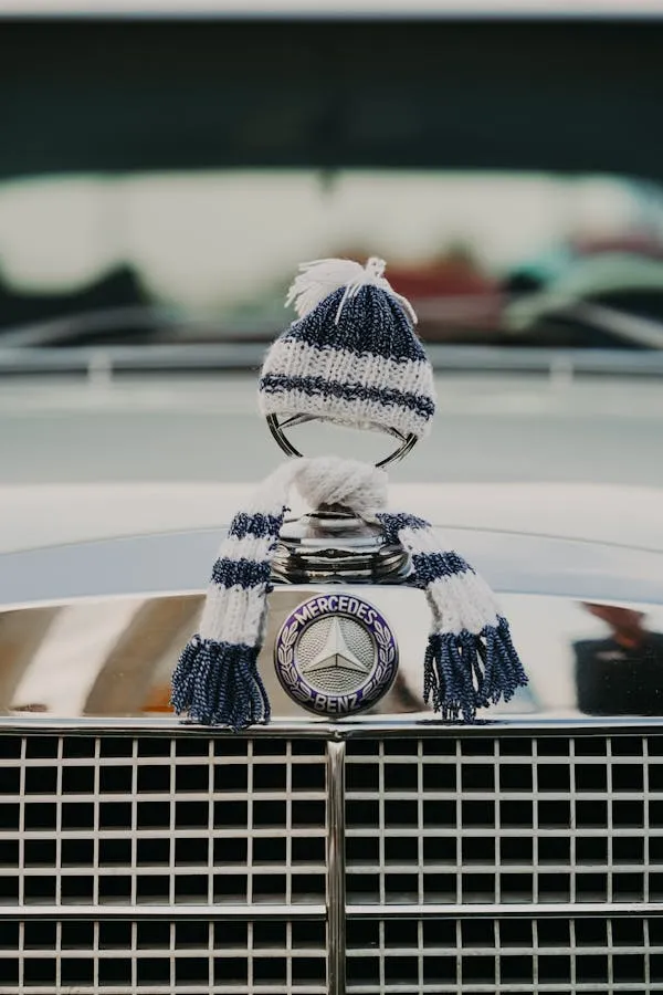 Closeup of Classic Mercedes Benz Hood Ornament and Grill