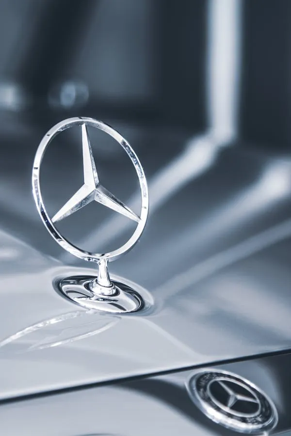 Closeup of Mercedes Benz Hood Ornament with Shiny Silver Finish