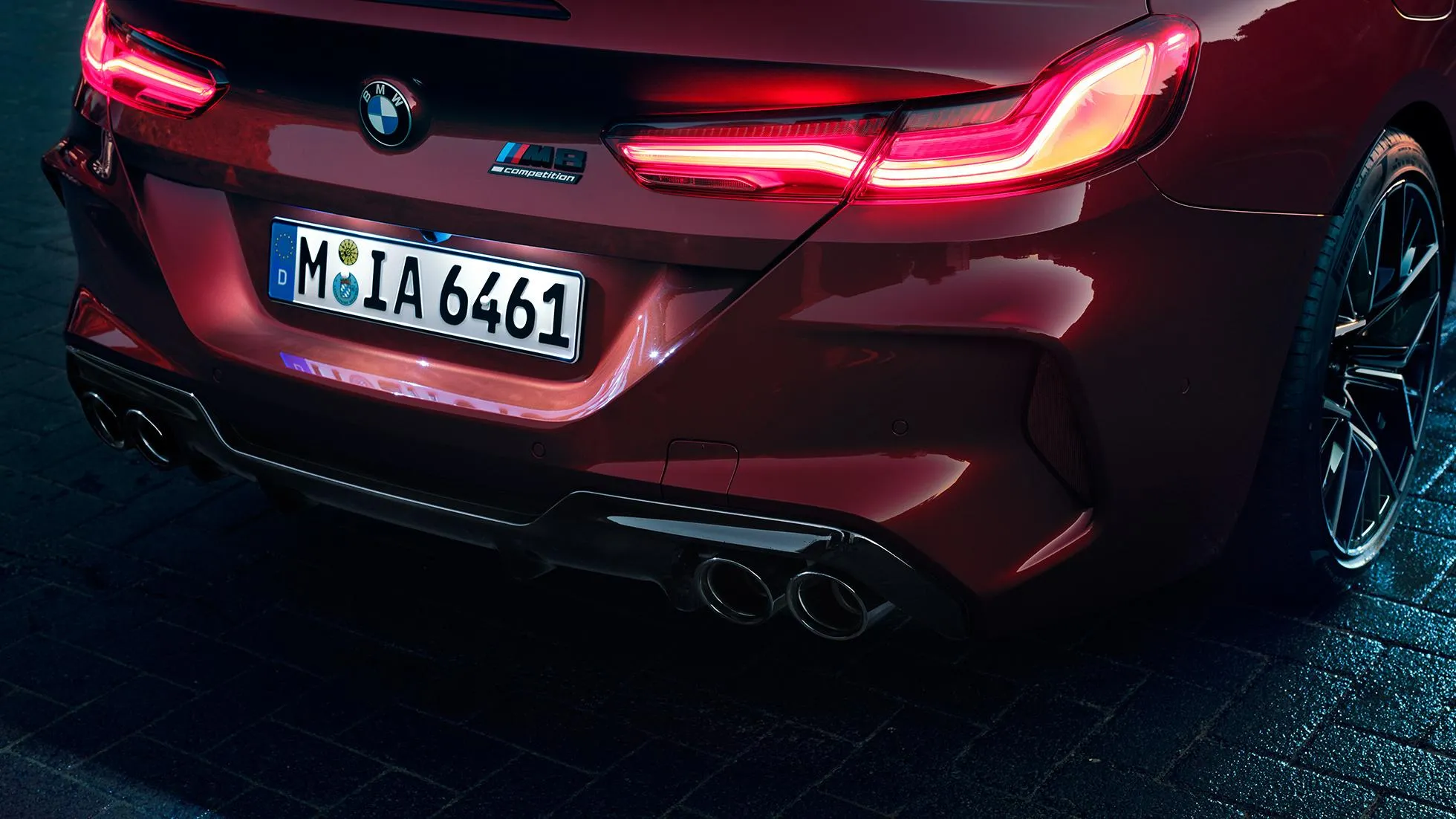 Closeup of Rear Bmw Taillights with License Plate Visible