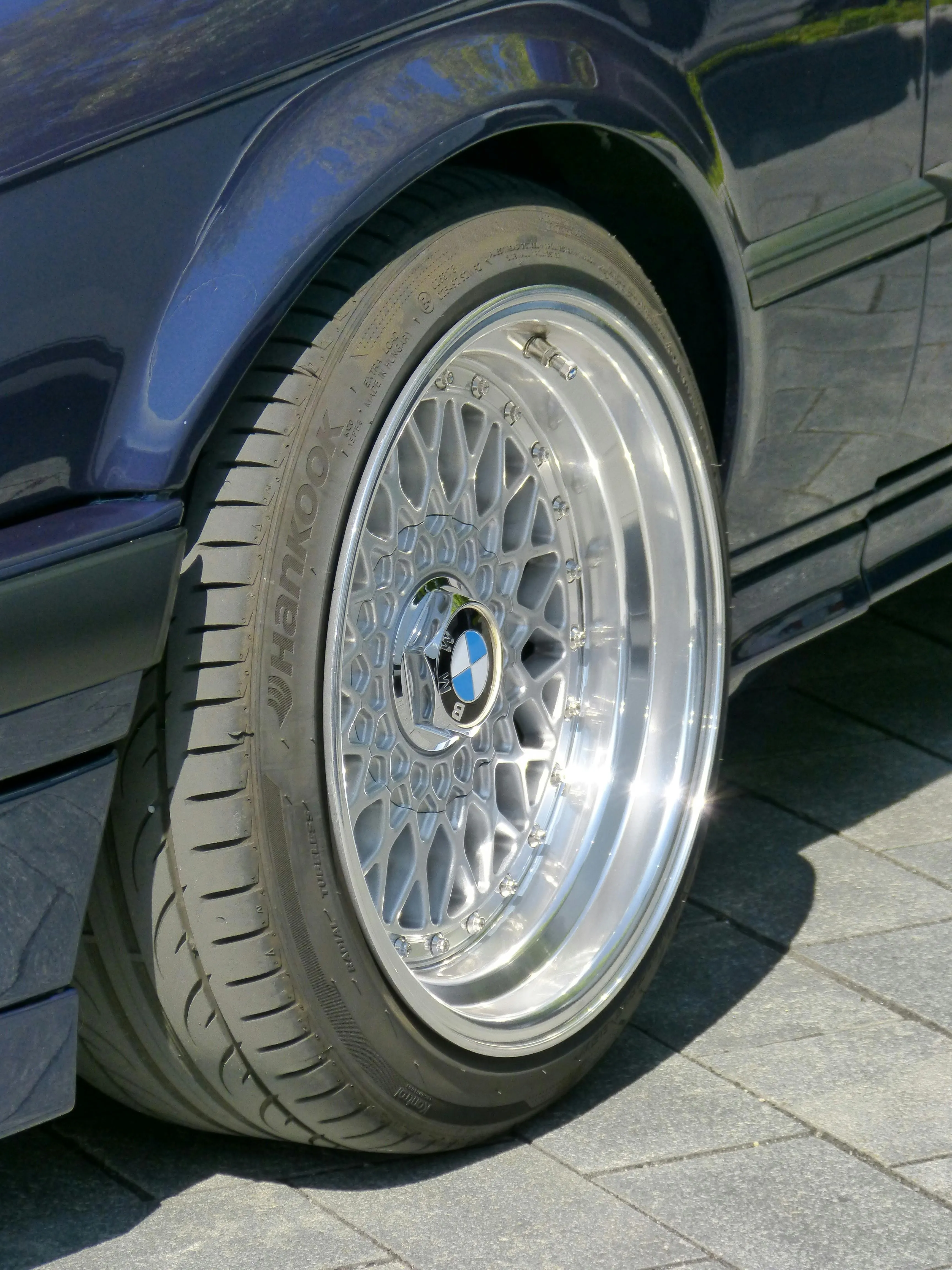Closeup of Vintage Bmw Wheel with Polished Alloy Rims