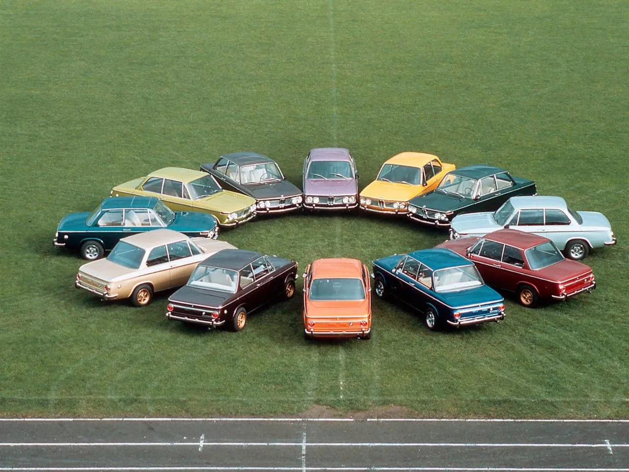 Collection of Classic Bmw Cars Parked on Green Field