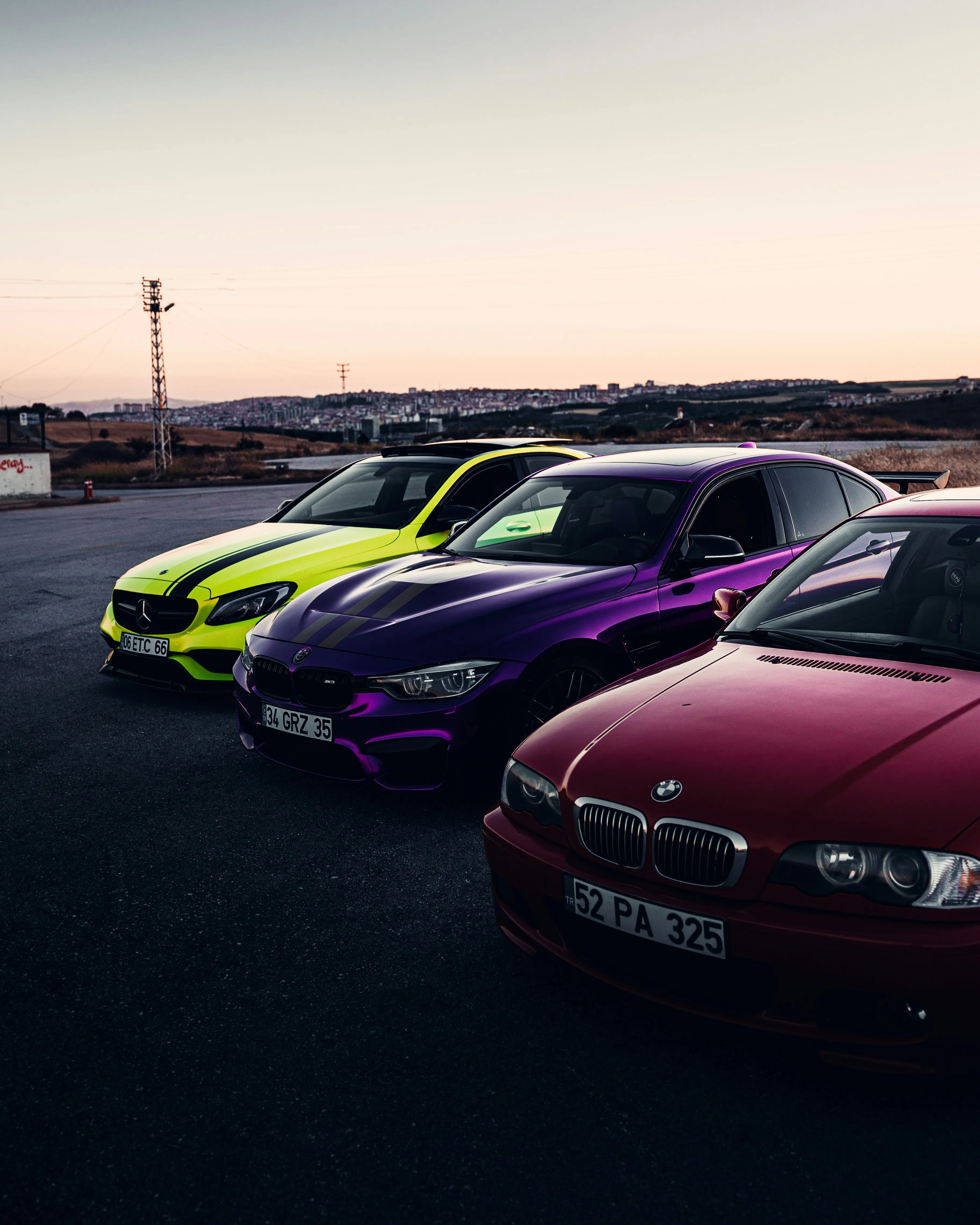 Colorful Lineup of Mercedes Benz Cars at Dusk image