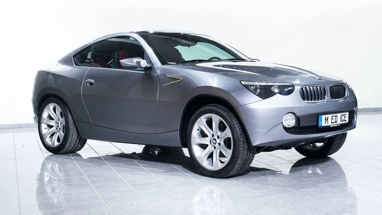 Compact Gray Bmw Coupe Parked on a White Background