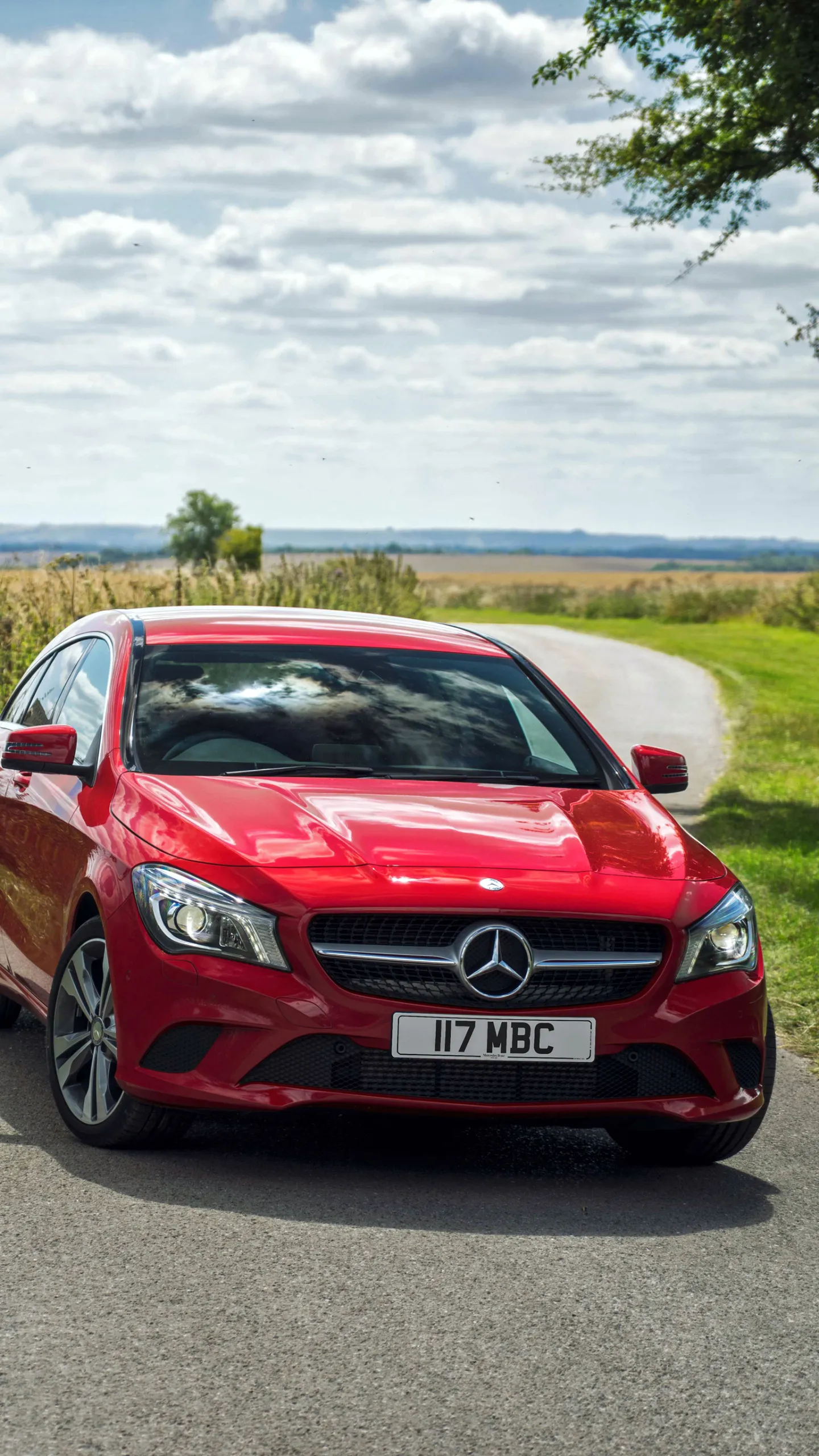 Compact Red Mercedes Benz Hatchback by Green Countryside