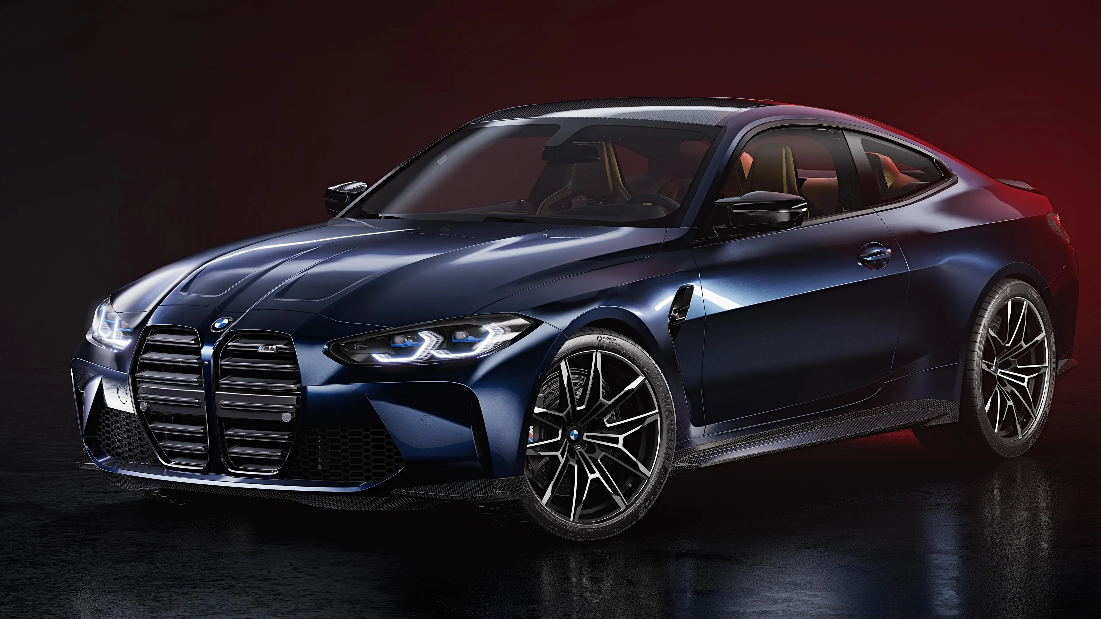 Dark Blue Bmw Coupe Displayed in Low Studio Lighting
