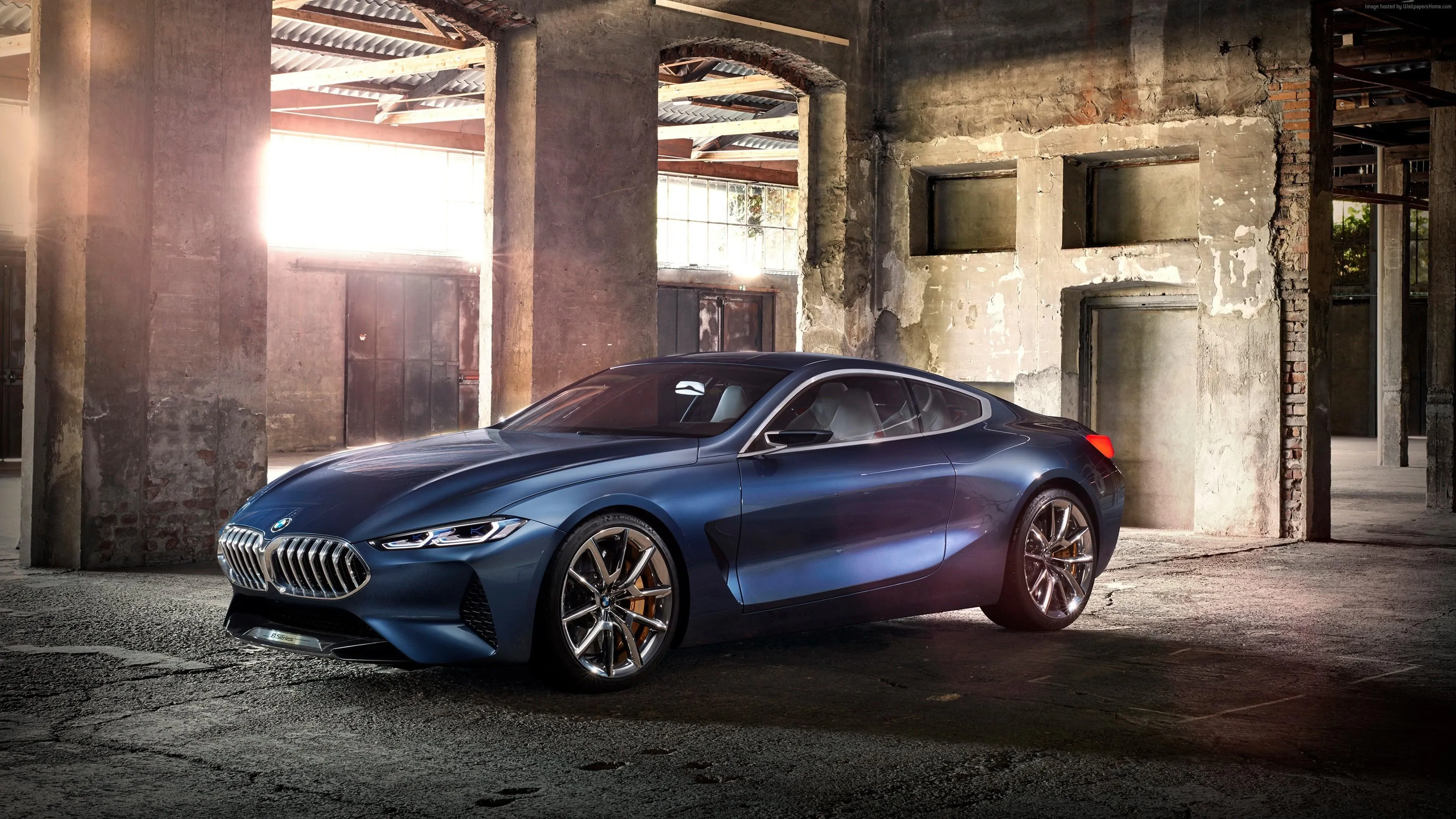 Dark Blue Bmw Sports Car Parked Under Concrete Urban Area