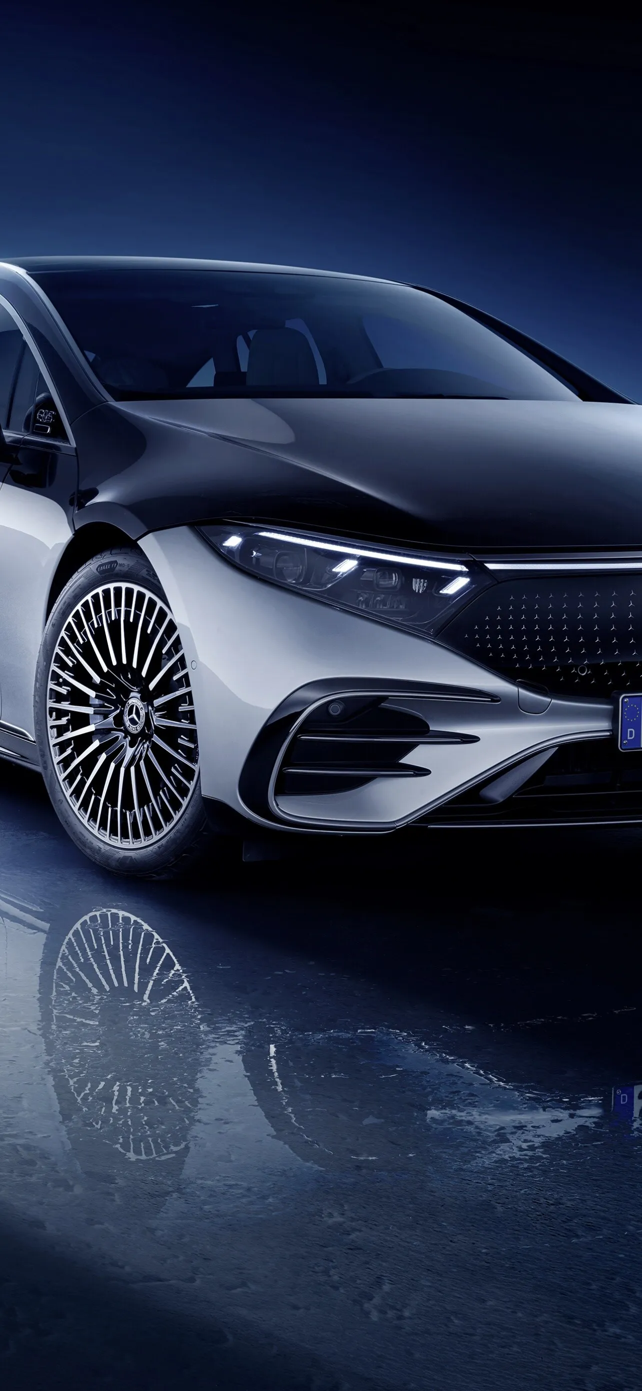 Elegant Mercedes EQS Displayed in Clean Blue Studio Light
