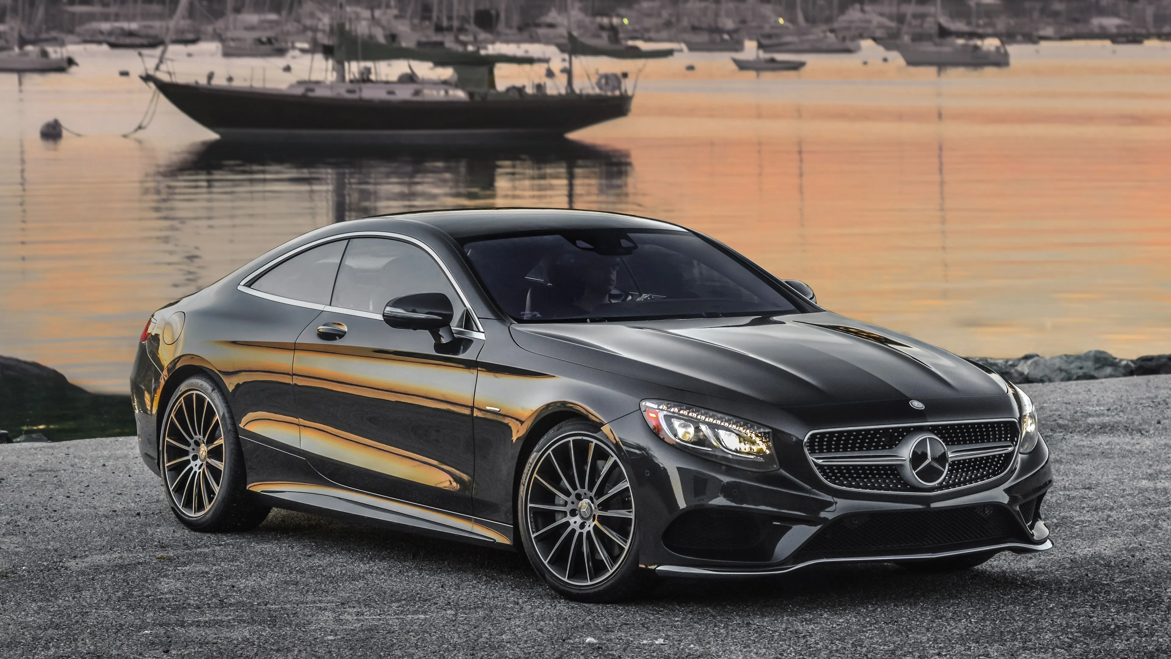 Elegant Mercedes Sedan Reflected in Calm Waterside View