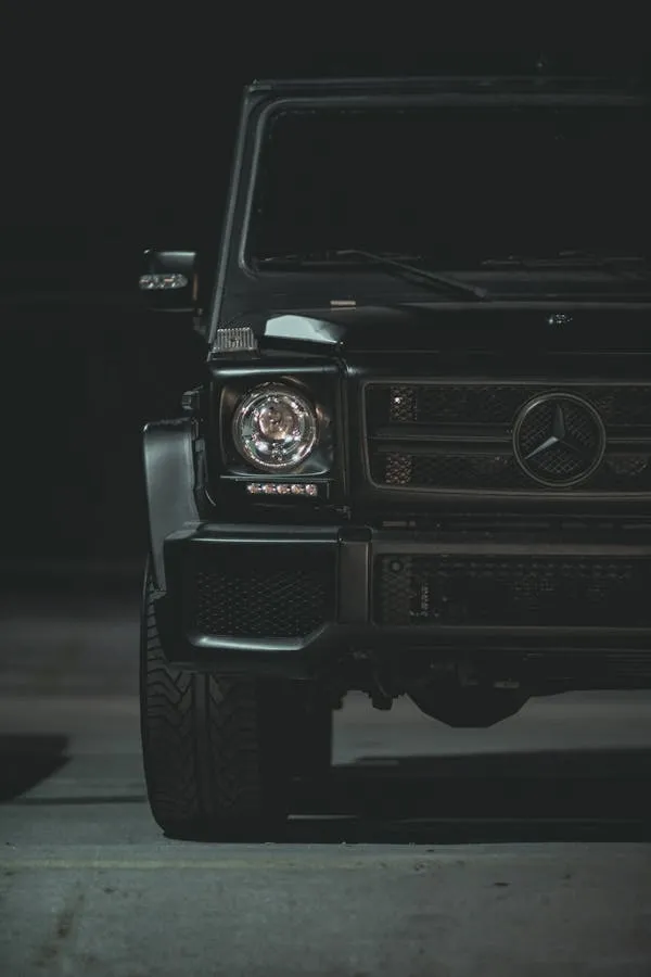 Front of Mercedes G Wagon in Dim Showroom Lighting Wallpaper