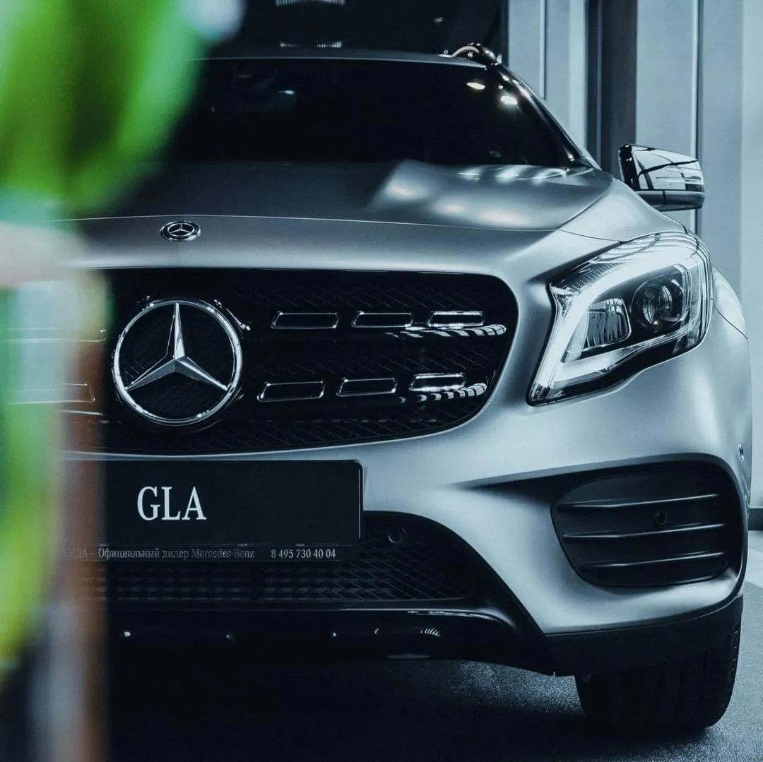 Front Profile of Mercedes GLA in Showroom Light 4K Wallpaper