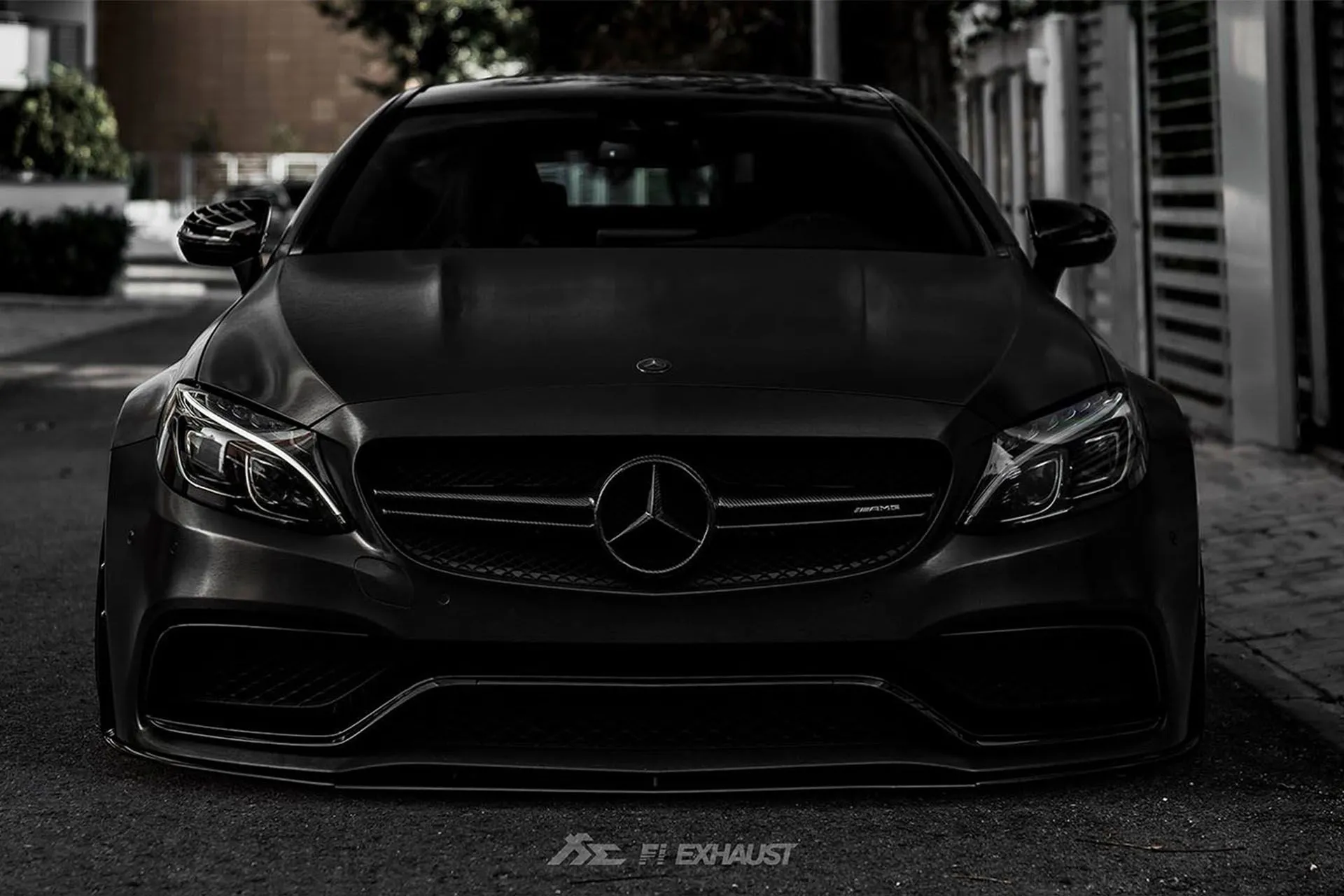 Front View of Black Mercedes Benz Parked in Alleyway