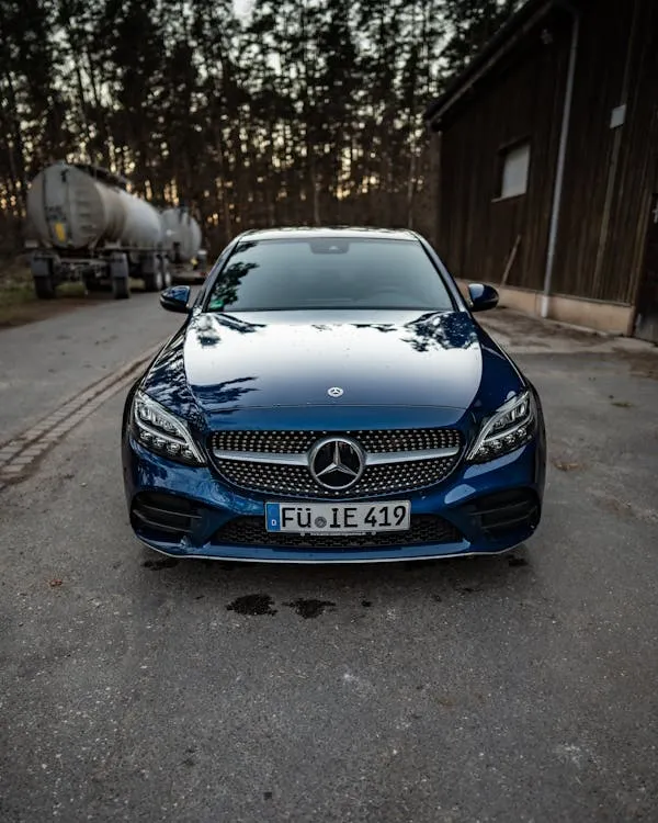 Front View of Blue Mercedes Benz in Outdoor Parking 4K