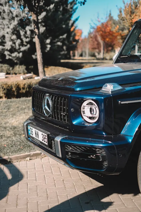 Front View of Blue Mercedes G Wagon in Daylight Wallpaper